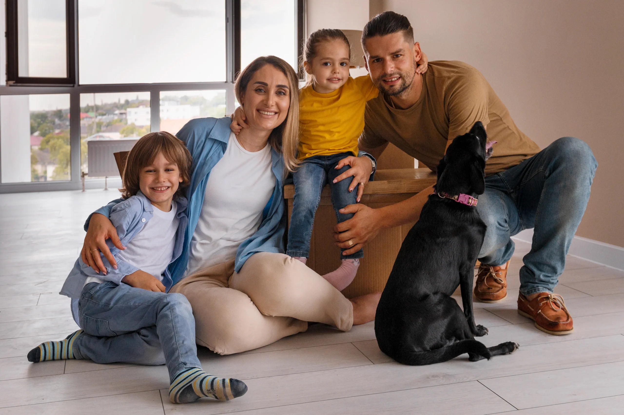 happy-family-with-dog-moving-new-home happy-family-with-dog-moving-new-home